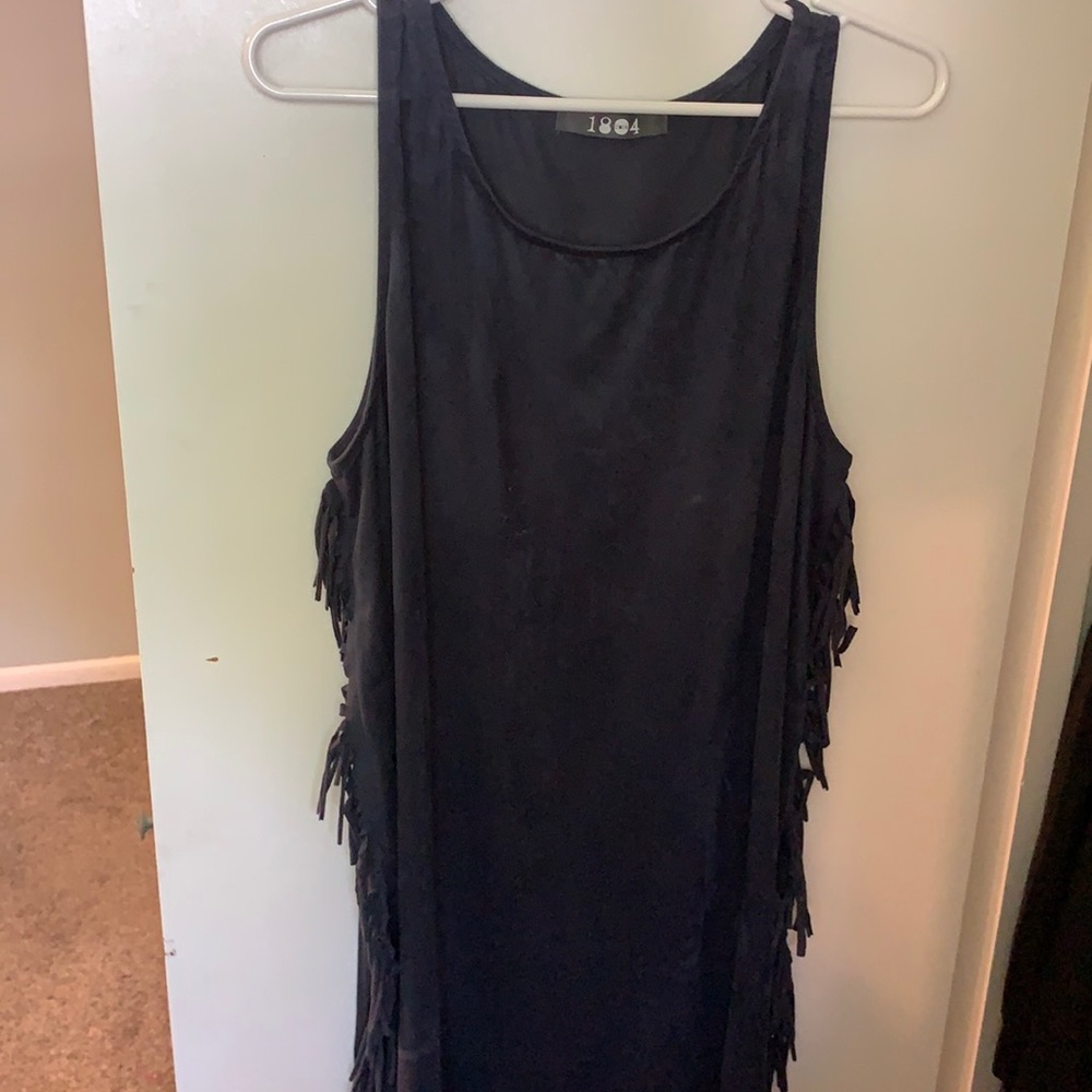 Suede dress with fringe on the sides